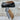 Folding knife with wooden handle and 'Roberts' engraving on a wooden surface