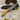Handcrafted Böhler N690 camping knife with olive wood handle and magnesium fire starter