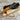 Handcrafted Böhler N690 camping knife with olive wood handle, leather sheath, and full back