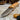 Handmade Böhler N690 bushcraft and camping knife with olive wood handle and leather sheath