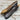 Handcrafted Böhler N690 camping knife with olive wood handle, leather sheath, and full back