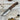 Handcrafted Böhler N690 camping knife with walnut wood handle and leather sheath